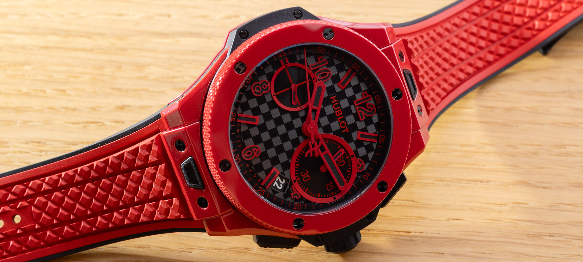 Hublot Big Bang Original 20th Anniversary Red Magic and All Black Ceramic watches side by side